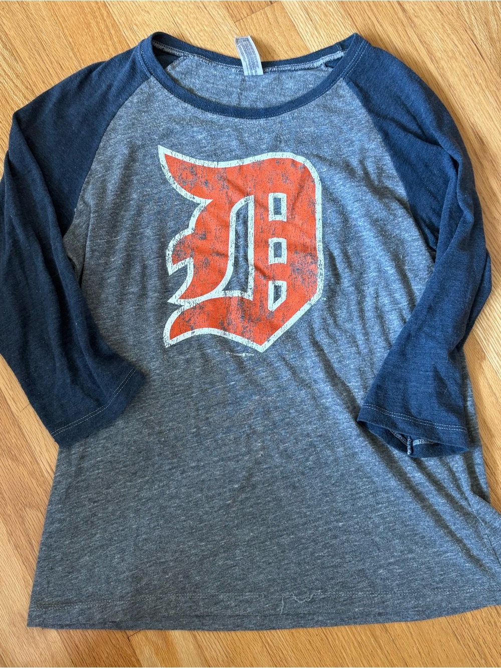 Women’s Navy & Gray Baseball Raglan Shirt with Orange Logo